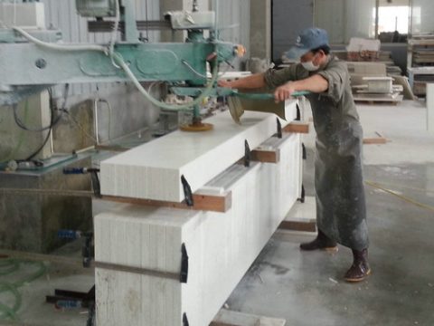 Johnson quartz Vietnamese worker making splash edge polish